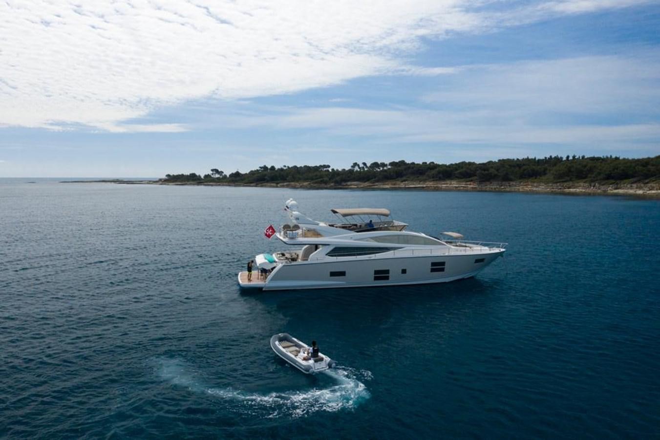 a boat sailing on the water aboard SUMMER BREEZE Yacht for Sale