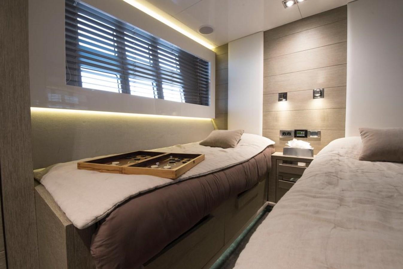 a room with two beds aboard SUMMER BREEZE Yacht for Sale