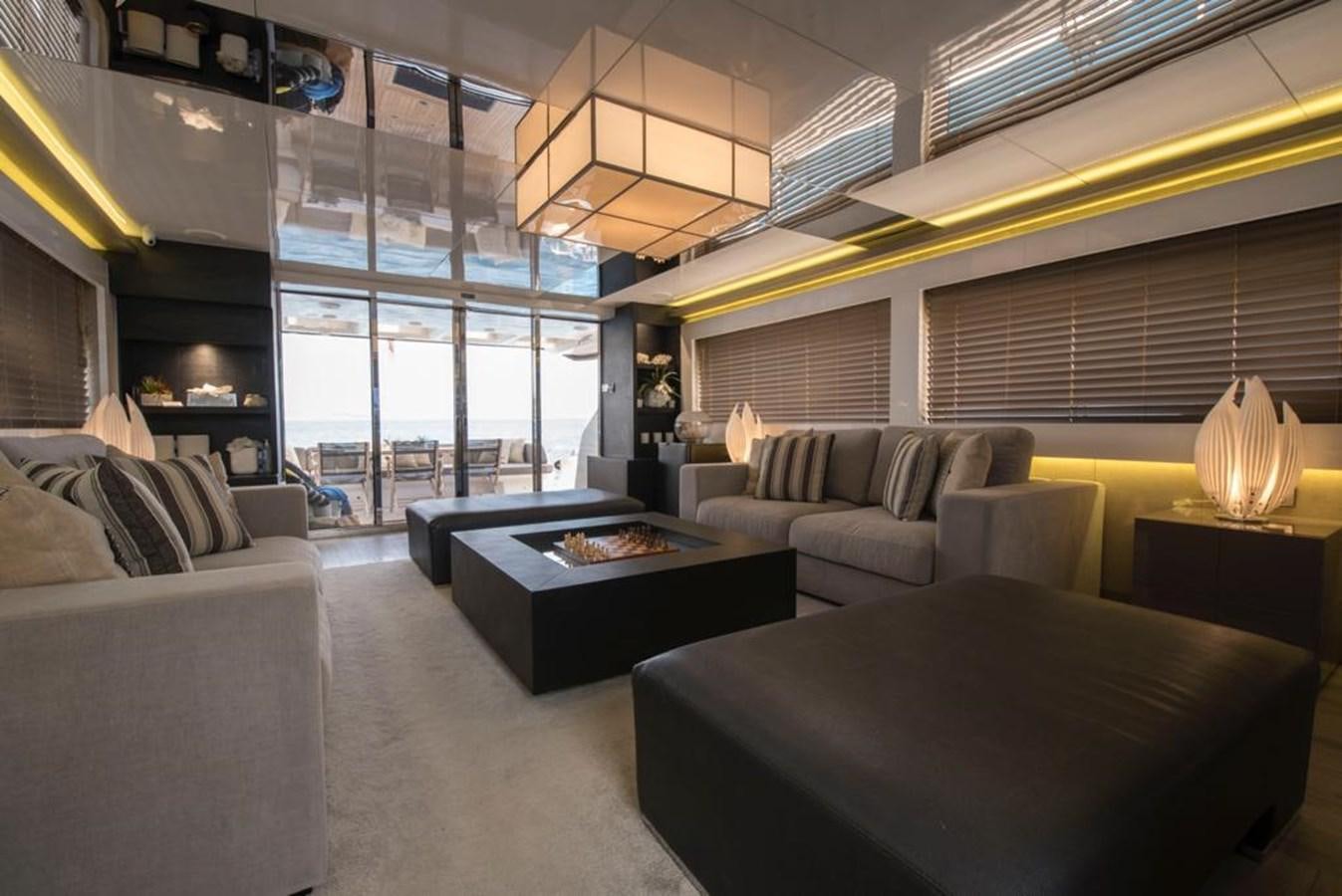 a living room with a large window aboard SUMMER BREEZE Yacht for Sale
