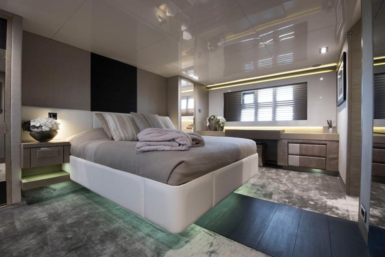 a large bedroom with a large bed aboard SUMMER BREEZE Yacht for Sale