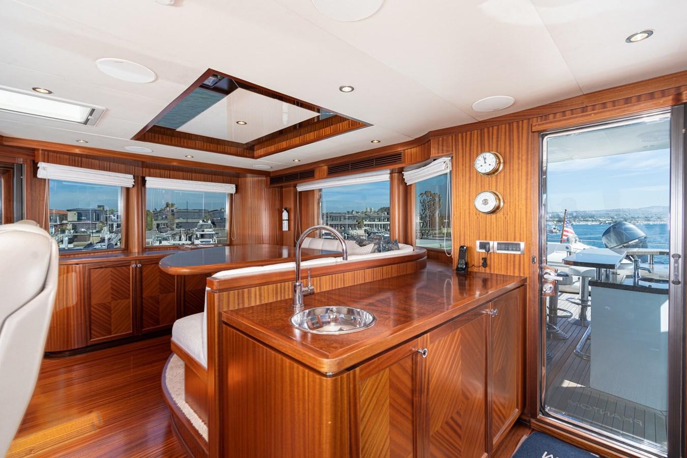 a kitchen with a sink and cabinets aboard PHANTOM Yacht for Sale