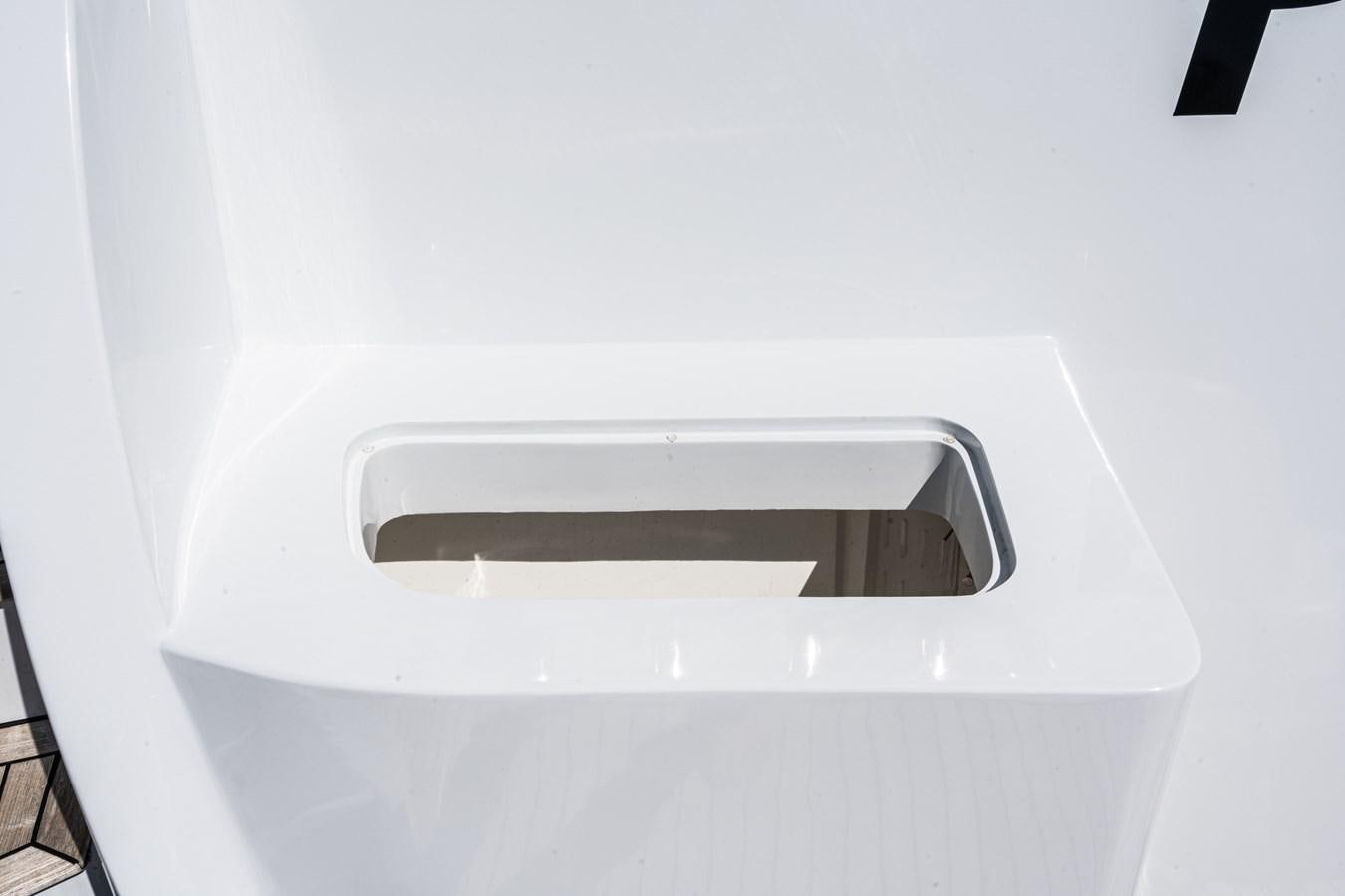 a white rectangular object with a silver handle aboard PHANTOM Yacht for Sale