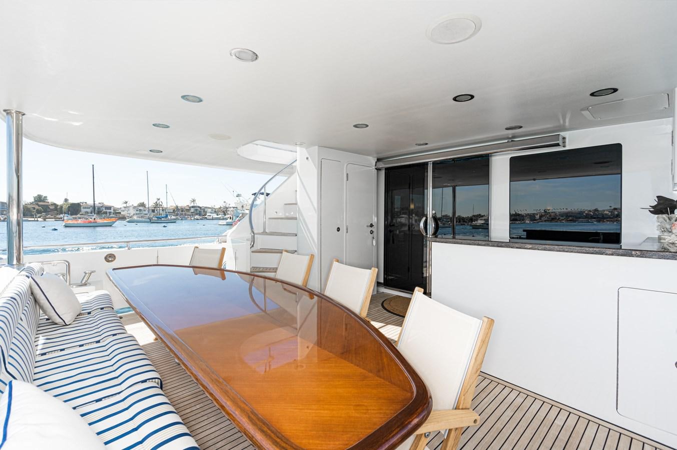 a large living room with a large balcony aboard PHANTOM Yacht for Sale