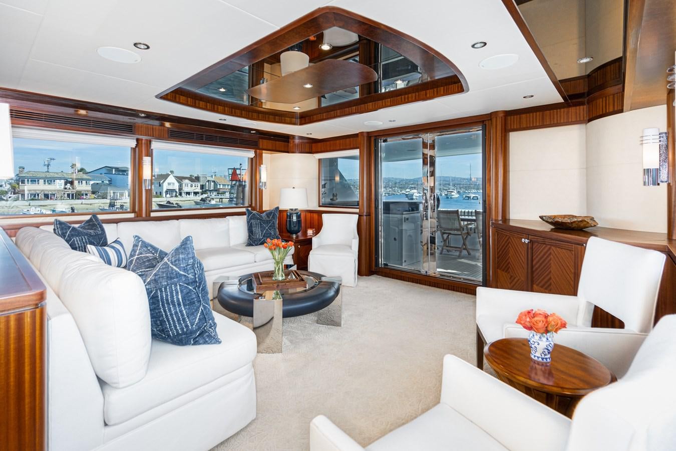a living room with a large window aboard PHANTOM Yacht for Sale