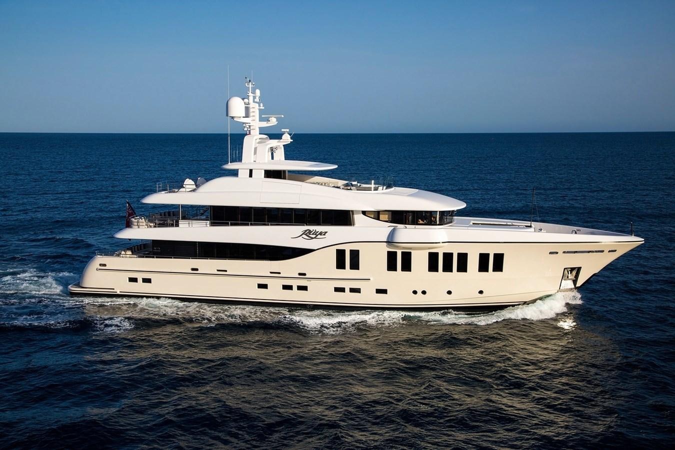 a white boat on the water aboard RUYA Yacht for Sale