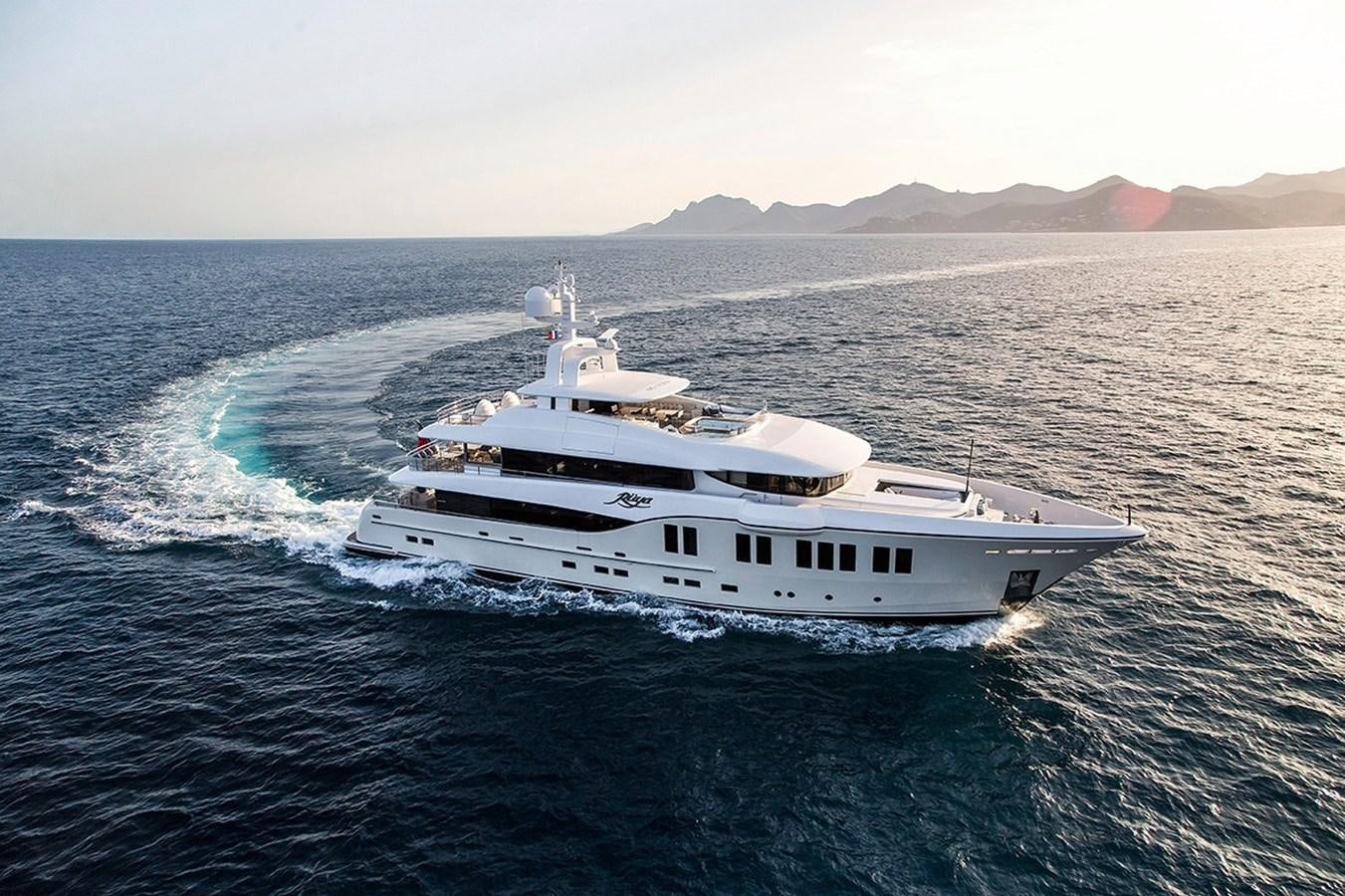 a white yacht on the water aboard RUYA Yacht for Sale