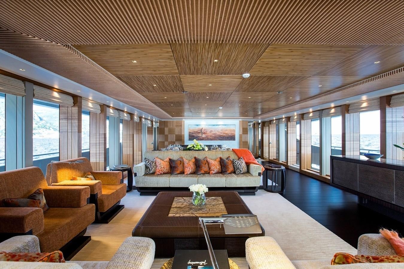 a living room with a large open floor plan aboard RUYA Yacht for Sale