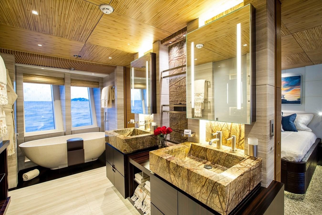 a bathroom with a large bathtub aboard RUYA Yacht for Sale