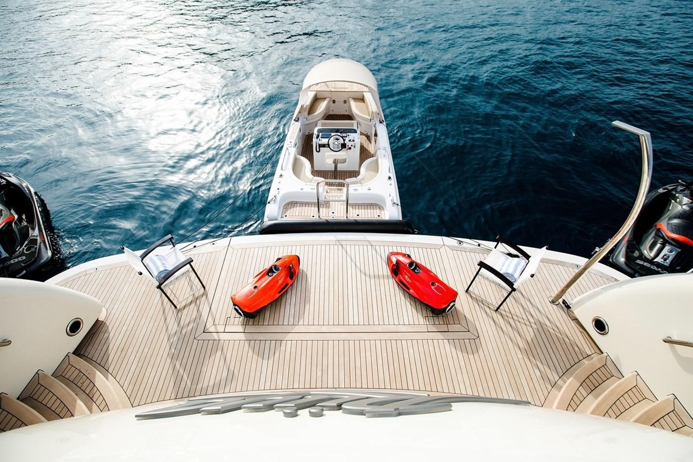 a boat with a red steering wheel aboard RUYA Yacht for Sale
