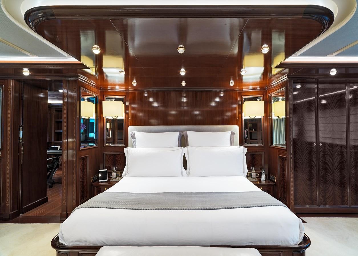 a bed in a room aboard BLUE EYES LONDON Yacht for Sale