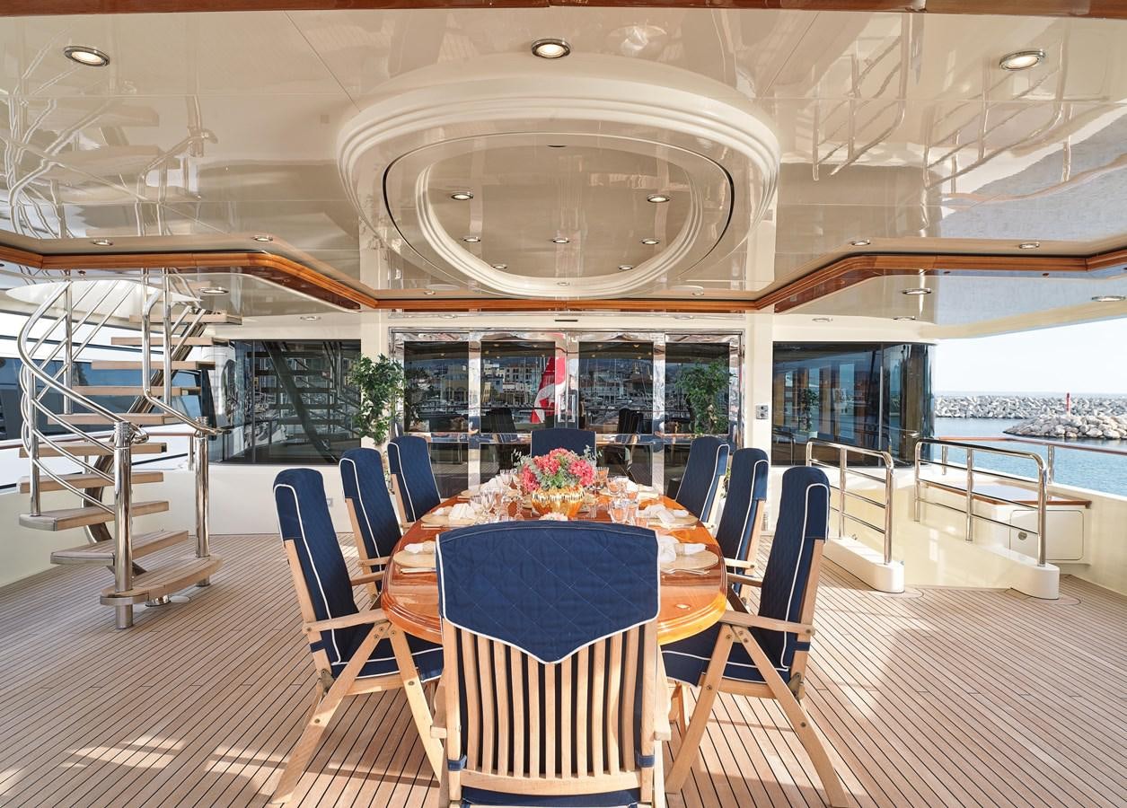 a room with a table and chairs aboard BLUE EYES LONDON Yacht for Sale