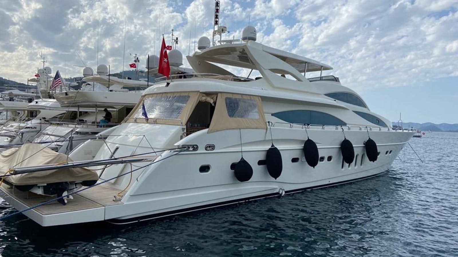 a white yacht on the water aboard CORAL Yacht for Sale