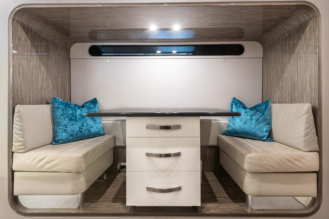 a white cabinet with drawers aboard DESIREE Yacht for Sale