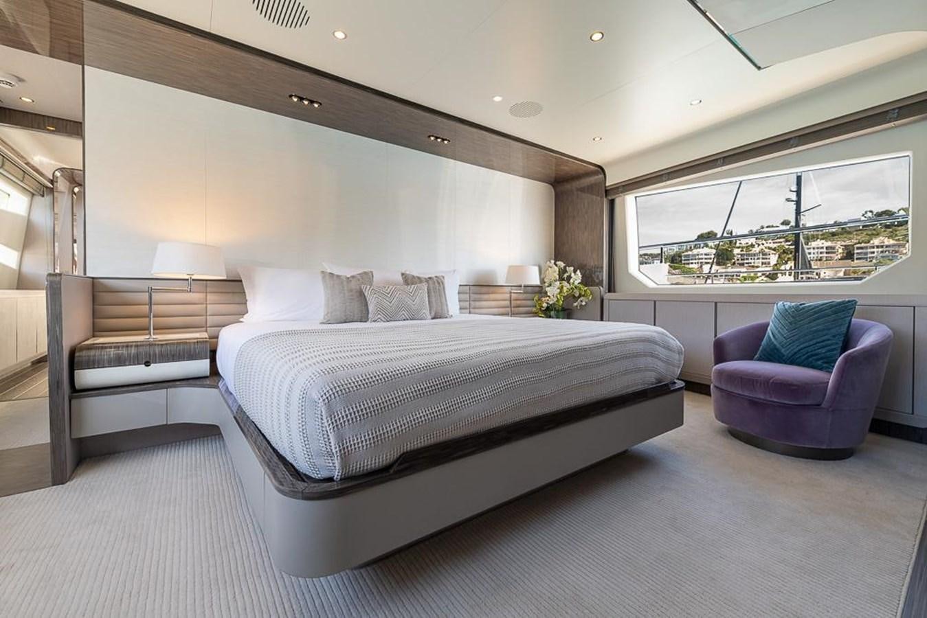 a large bed in a room aboard DESIREE Yacht for Sale