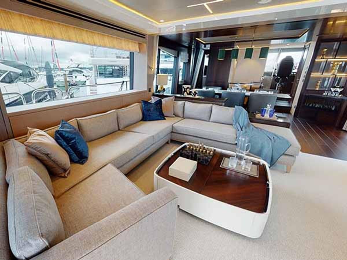 a living room with a couch and a coffee table aboard 88 YACHT - M/Y IP Yacht for Sale