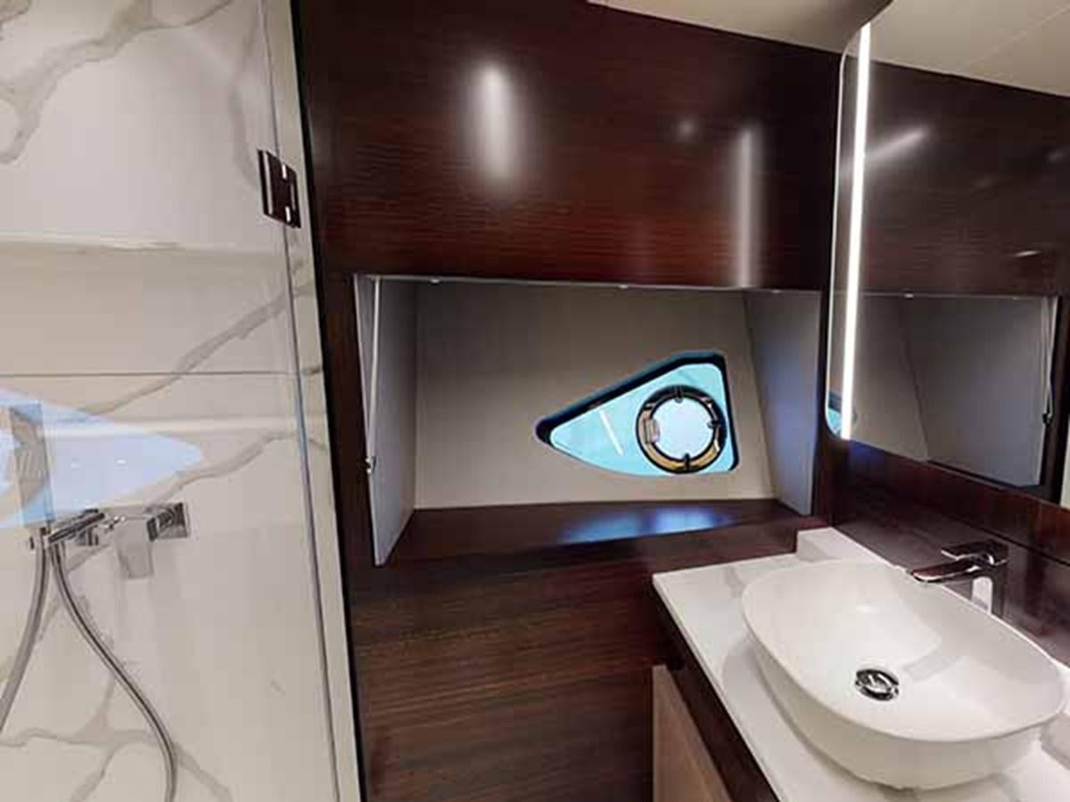a bathroom with a sink and a mirror aboard 88 YACHT - M/Y IP Yacht for Sale