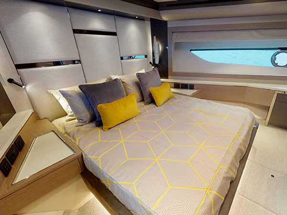 a bed with yellow pillows aboard 88 YACHT - M/Y IP Yacht for Sale