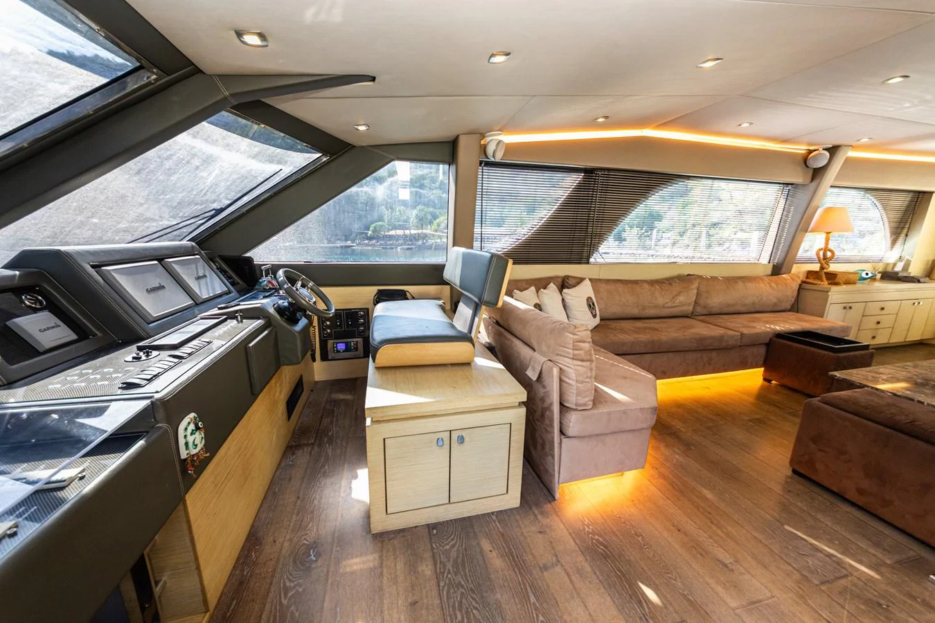 inside of a vehicle with a large window and a wood floor aboard WATER Yacht for Sale