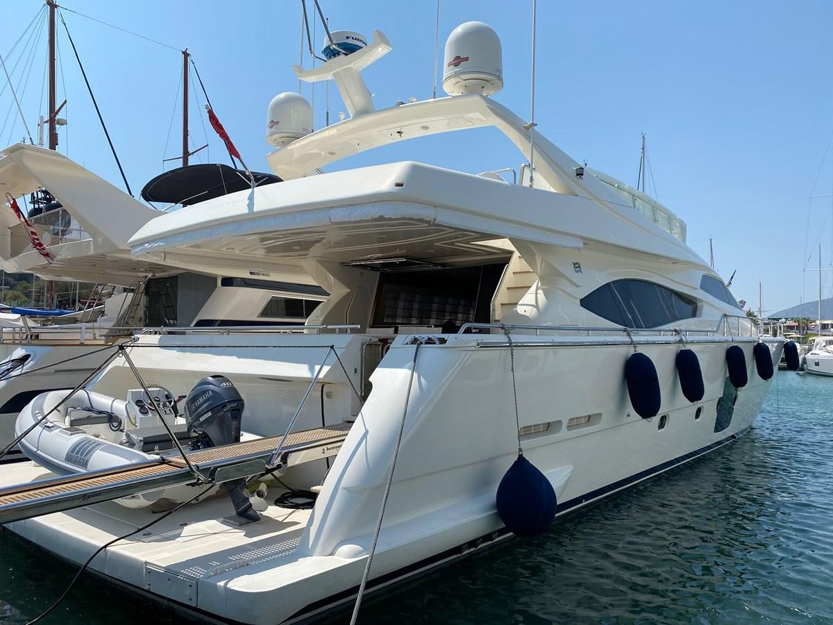 a white yacht in the water aboard DELMARE Yacht for Sale