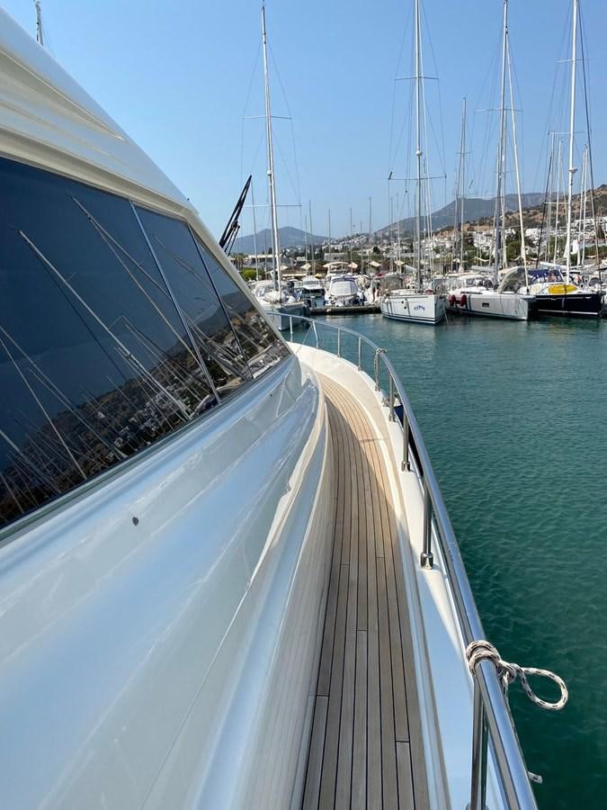 a boat is parked in the water aboard DELMARE Yacht for Sale