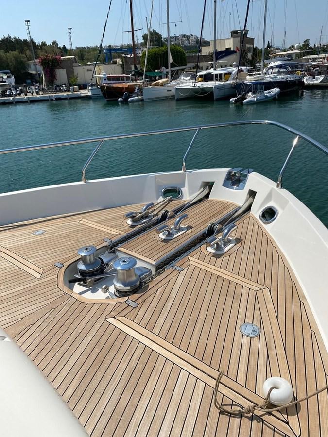 a deck with a boat on it aboard DELMARE Yacht for Sale