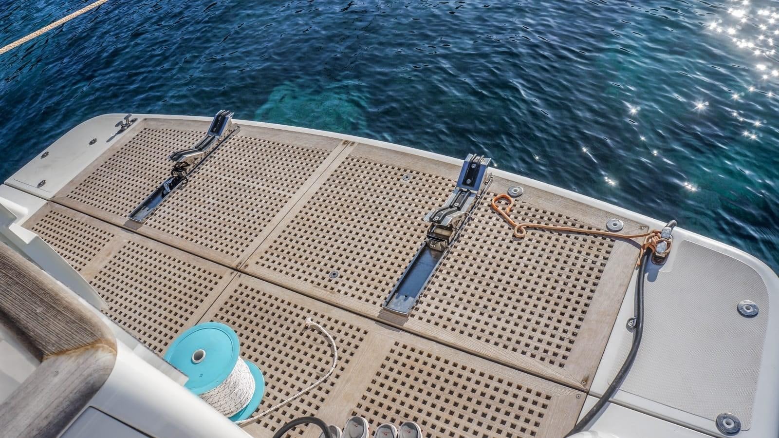 a fishing rod on a boat aboard KUUM Yacht for Sale