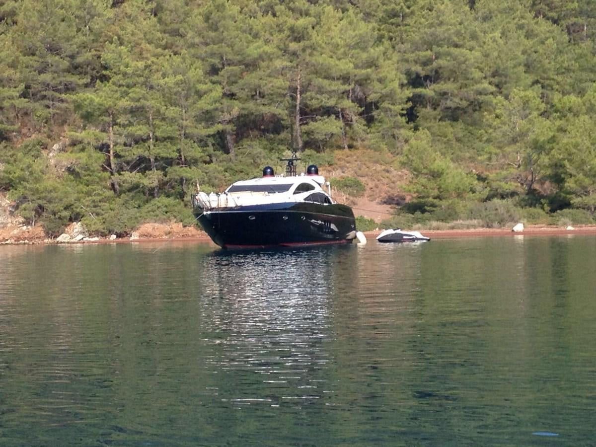 a boat on the water aboard JUNIOR Yacht for Sale