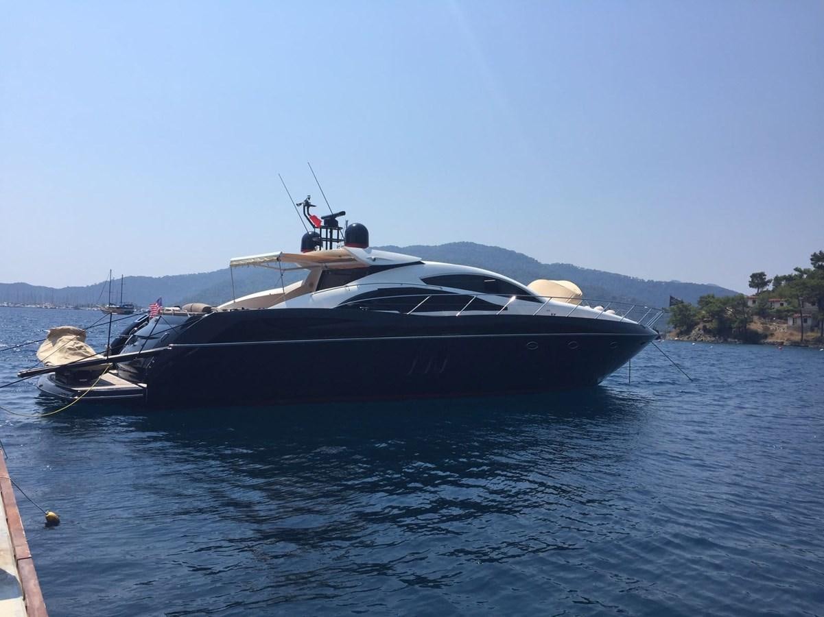 a boat on the water aboard JUNIOR Yacht for Sale