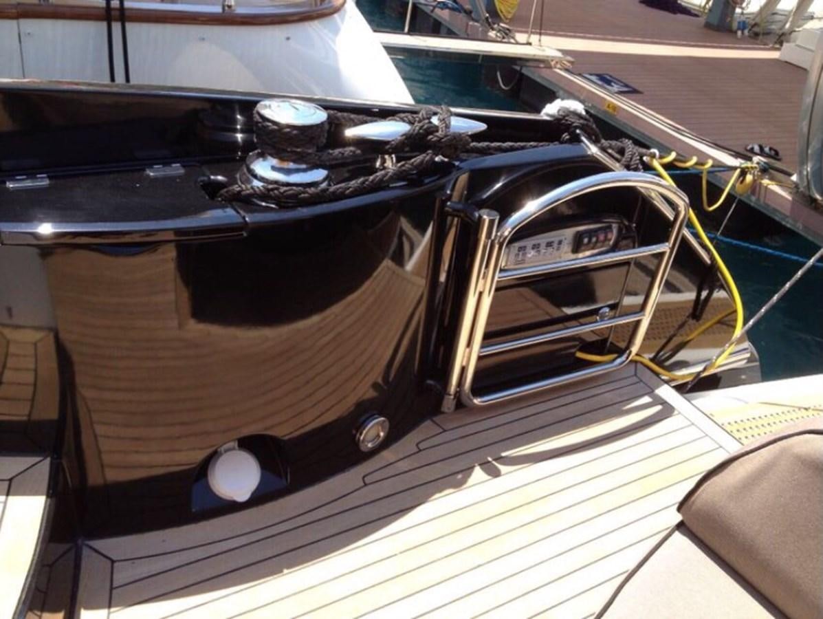 the engine of a car aboard JUNIOR Yacht for Sale