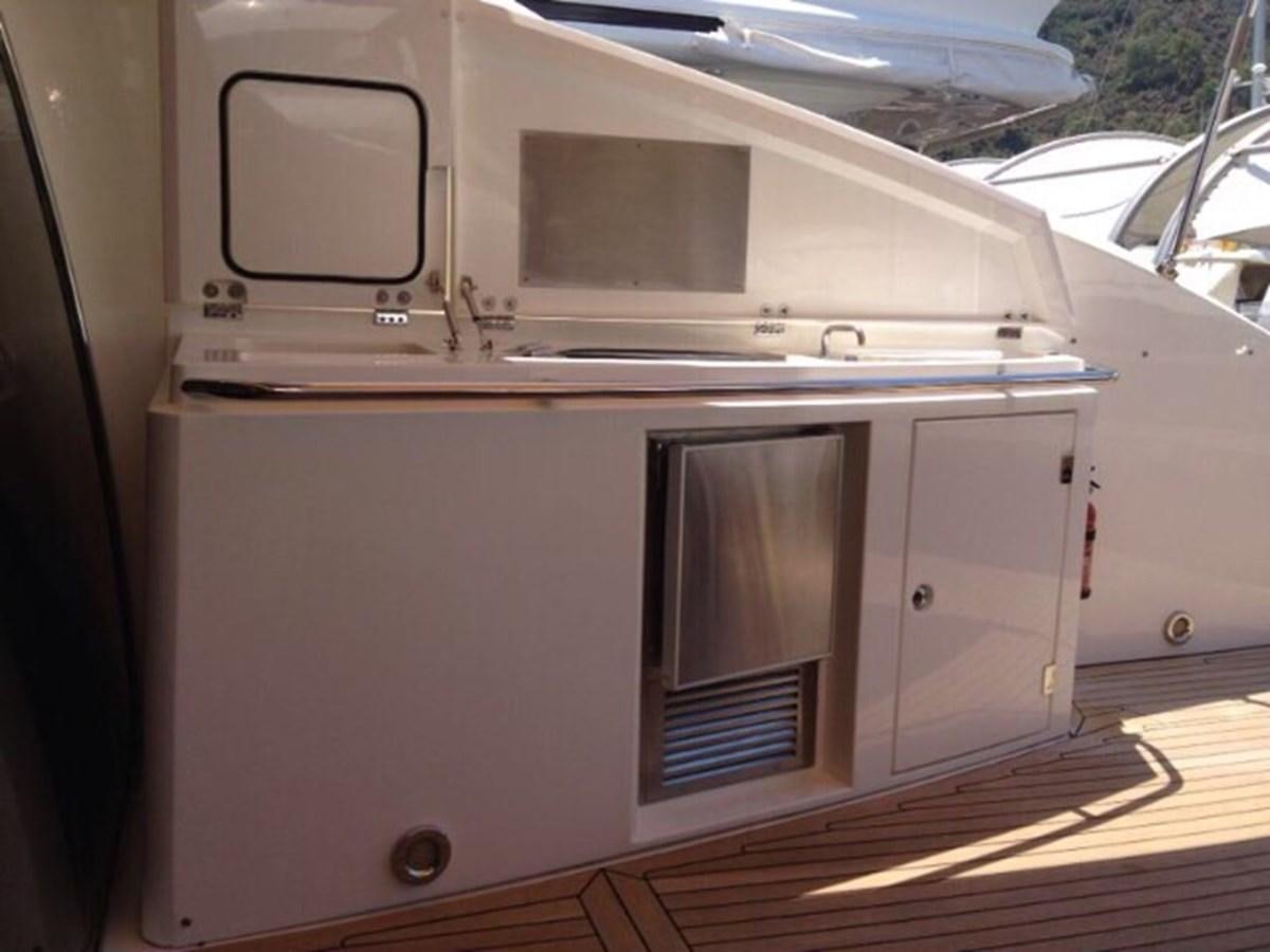 a silver and black machine aboard JUNIOR Yacht for Sale