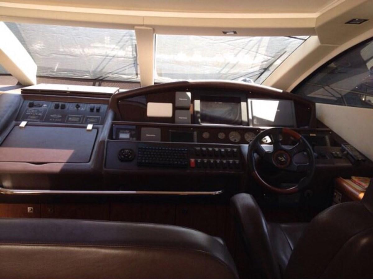 the inside of a car aboard JUNIOR Yacht for Sale
