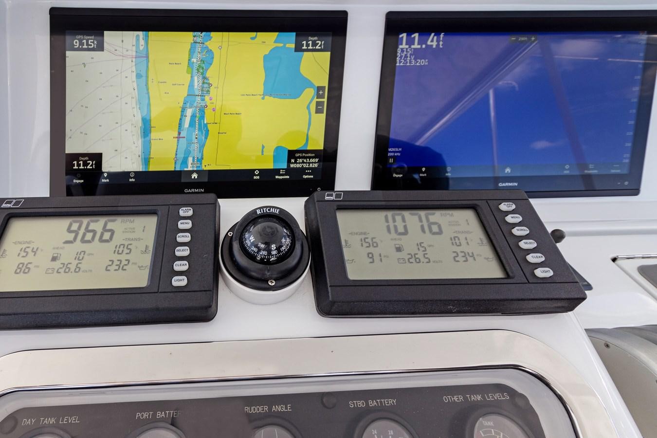 a radio and a monitor aboard TRUE XII Yacht for Sale
