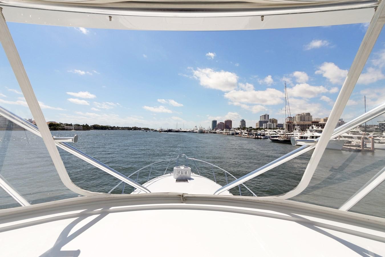 a view of a city from a window of a boat aboard TRUE XII Yacht for Sale
