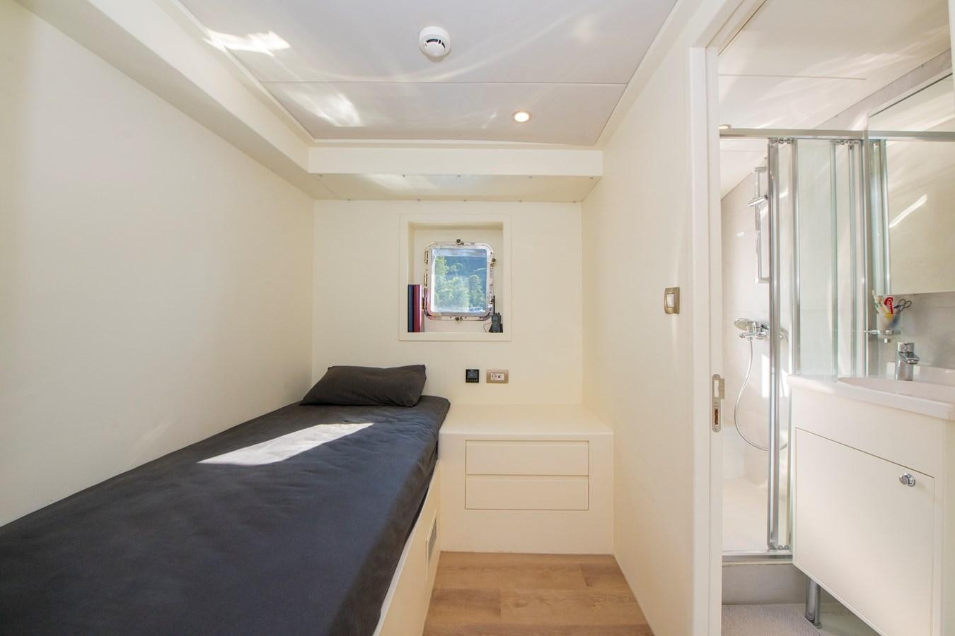 a bed in a room aboard MOTORSAILOR 41M Yacht for Sale