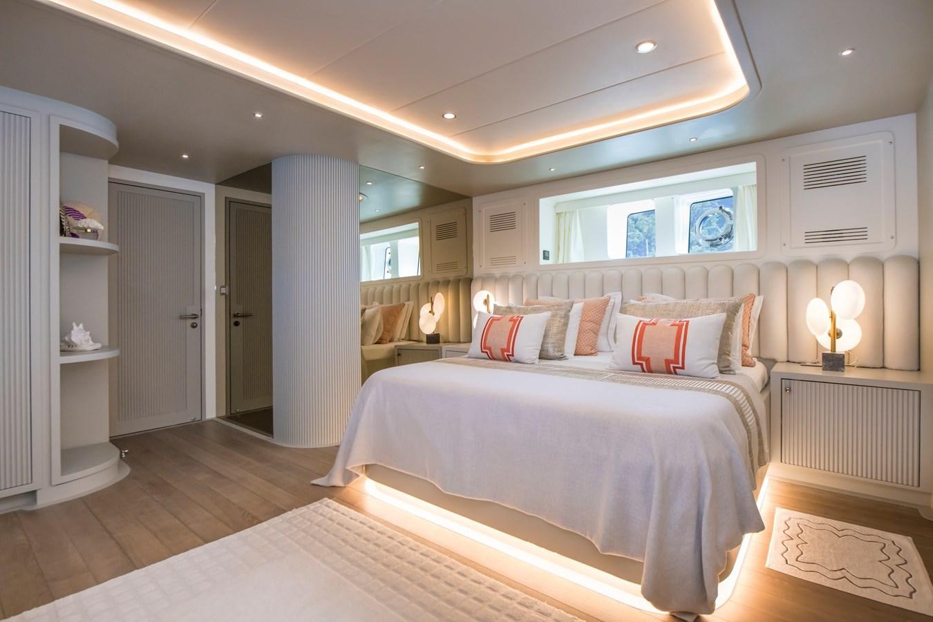 a large bedroom with a large bed aboard MOTORSAILOR 41M Yacht for Sale