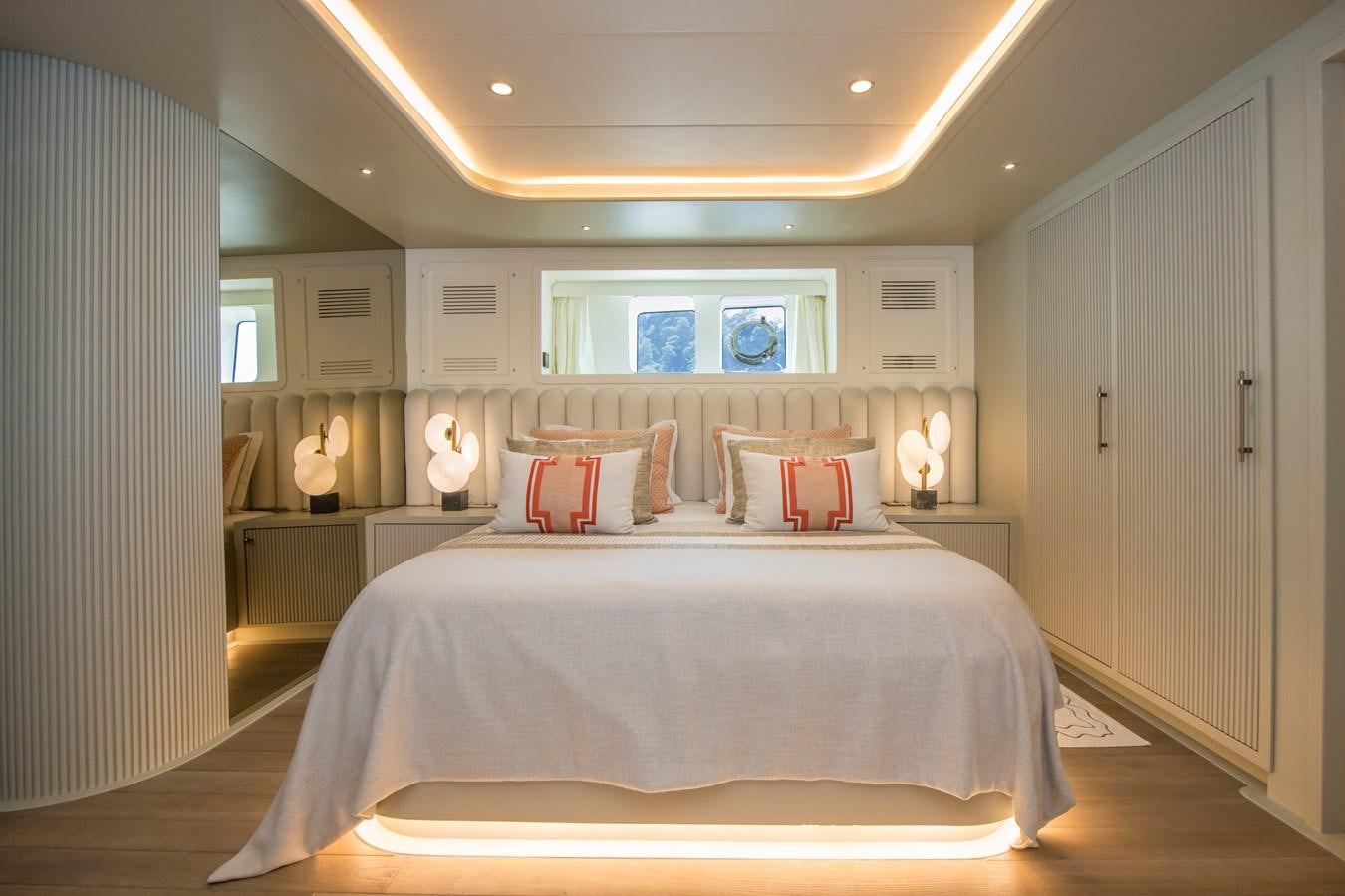 a bed in a room aboard MOTORSAILOR 41M Yacht for Sale