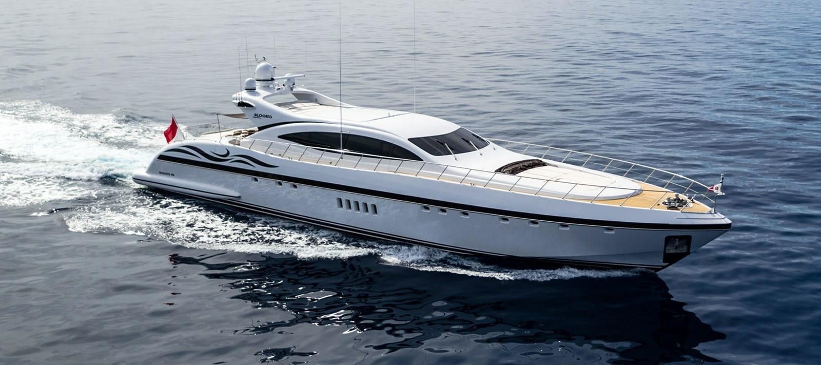 a white yacht on the water aboard BLOOMS Yacht for Sale