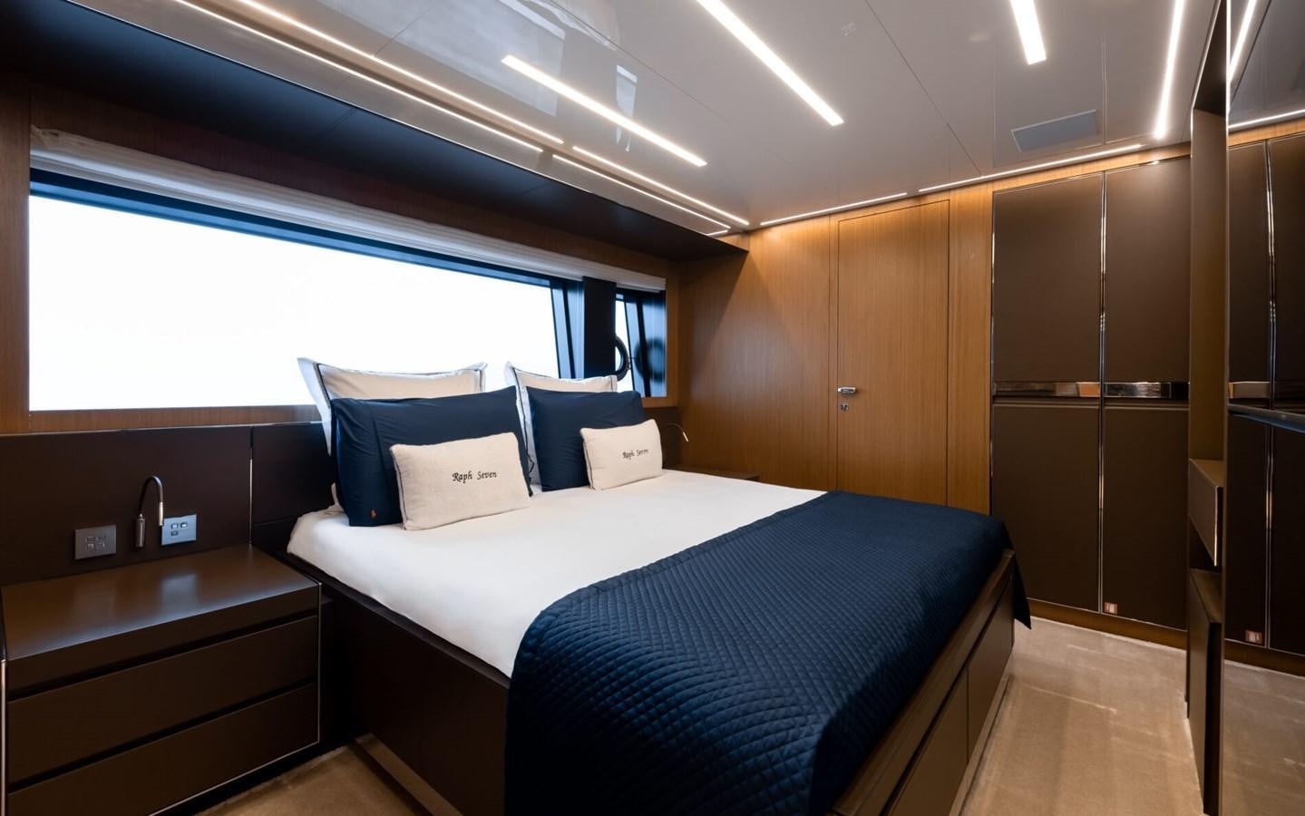 a bed in a room aboard RAPH SEVEN II Yacht for Sale