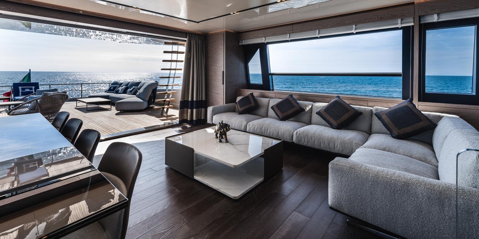 a living room with a large window aboard ZOUT Yacht for Sale
