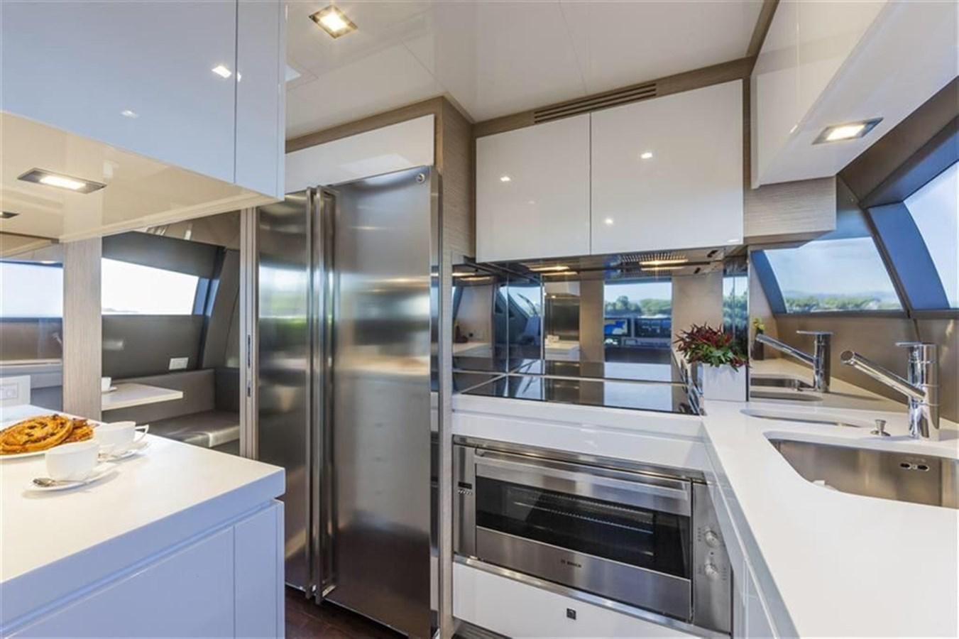 a kitchen with stainless steel appliances aboard AMO Yacht for Sale
