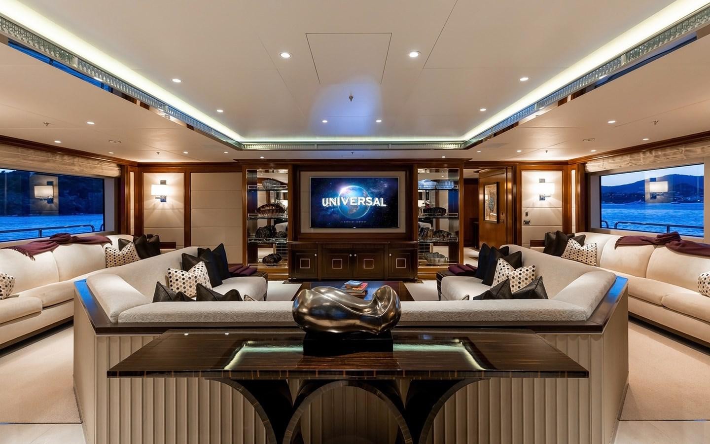 a living room with a large television aboard SEANNA Yacht for Sale