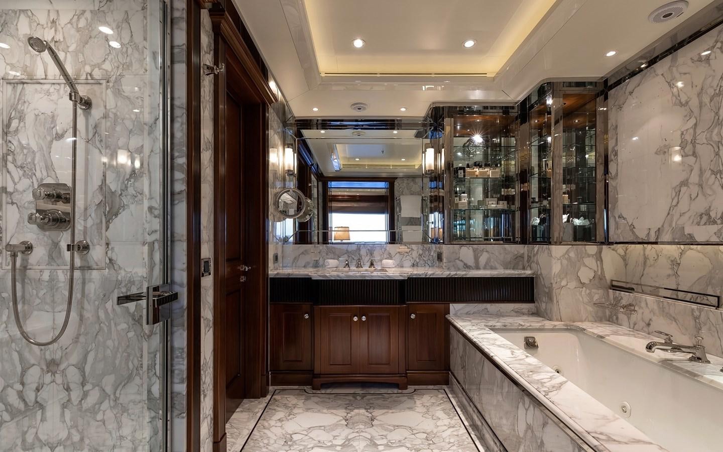 a bathroom with a large tub aboard SEANNA Yacht for Sale