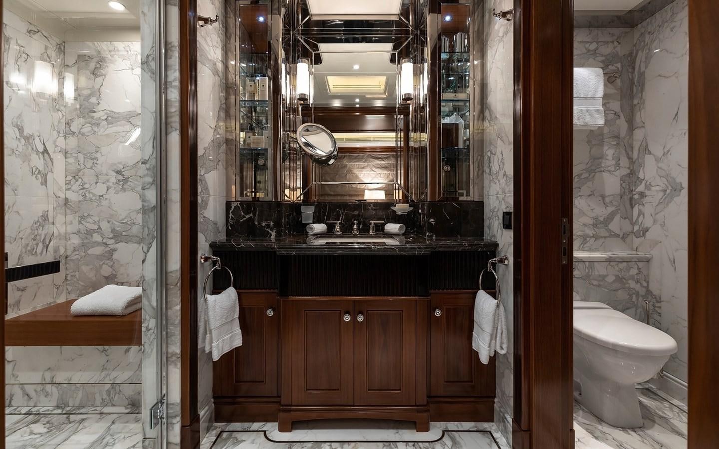 a bathroom with a sink and a toilet aboard SEANNA Yacht for Sale