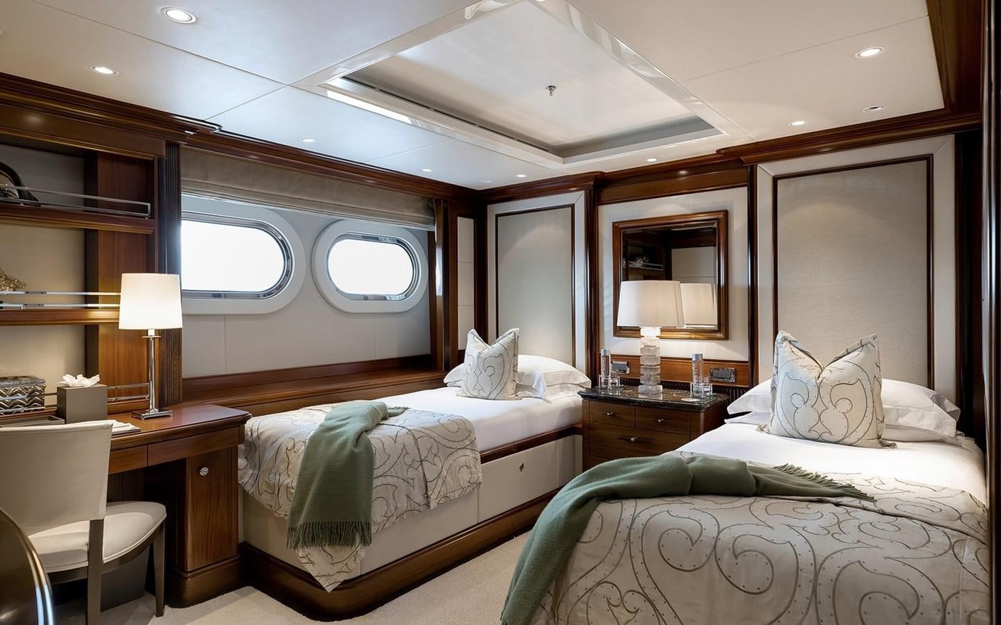 a couple of beds in a hotel room aboard SEANNA Yacht for Sale