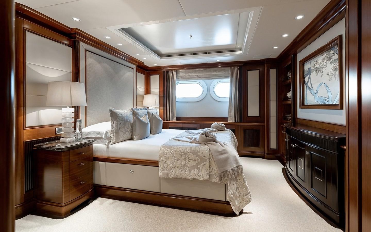 a bedroom with a large bed aboard SEANNA Yacht for Sale