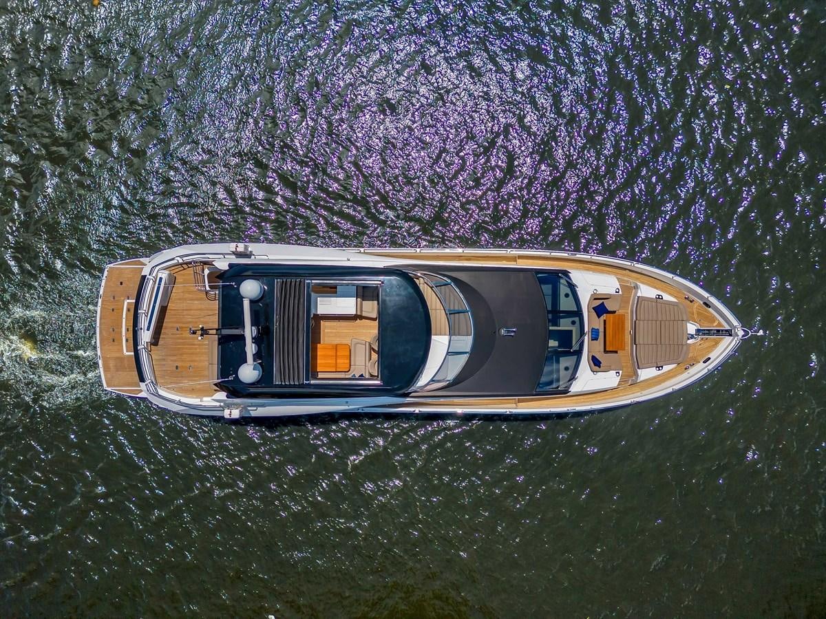 a car with a door on it aboard 86 Yacht for Sale