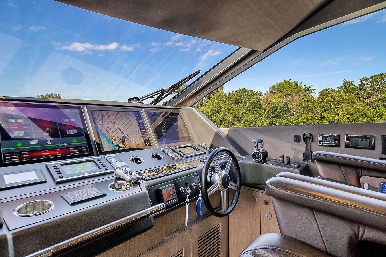 inside of a car aboard 86 Yacht for Sale