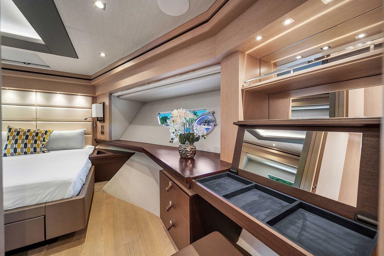 a room with a bed and a desk aboard 86 Yacht for Sale
