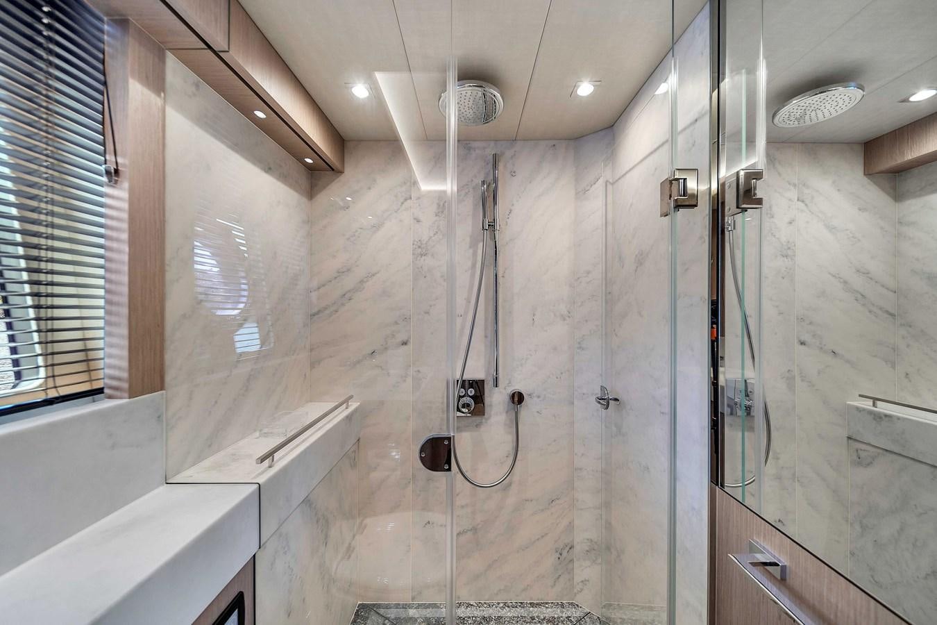 a shower with a shower head aboard 86 Yacht for Sale