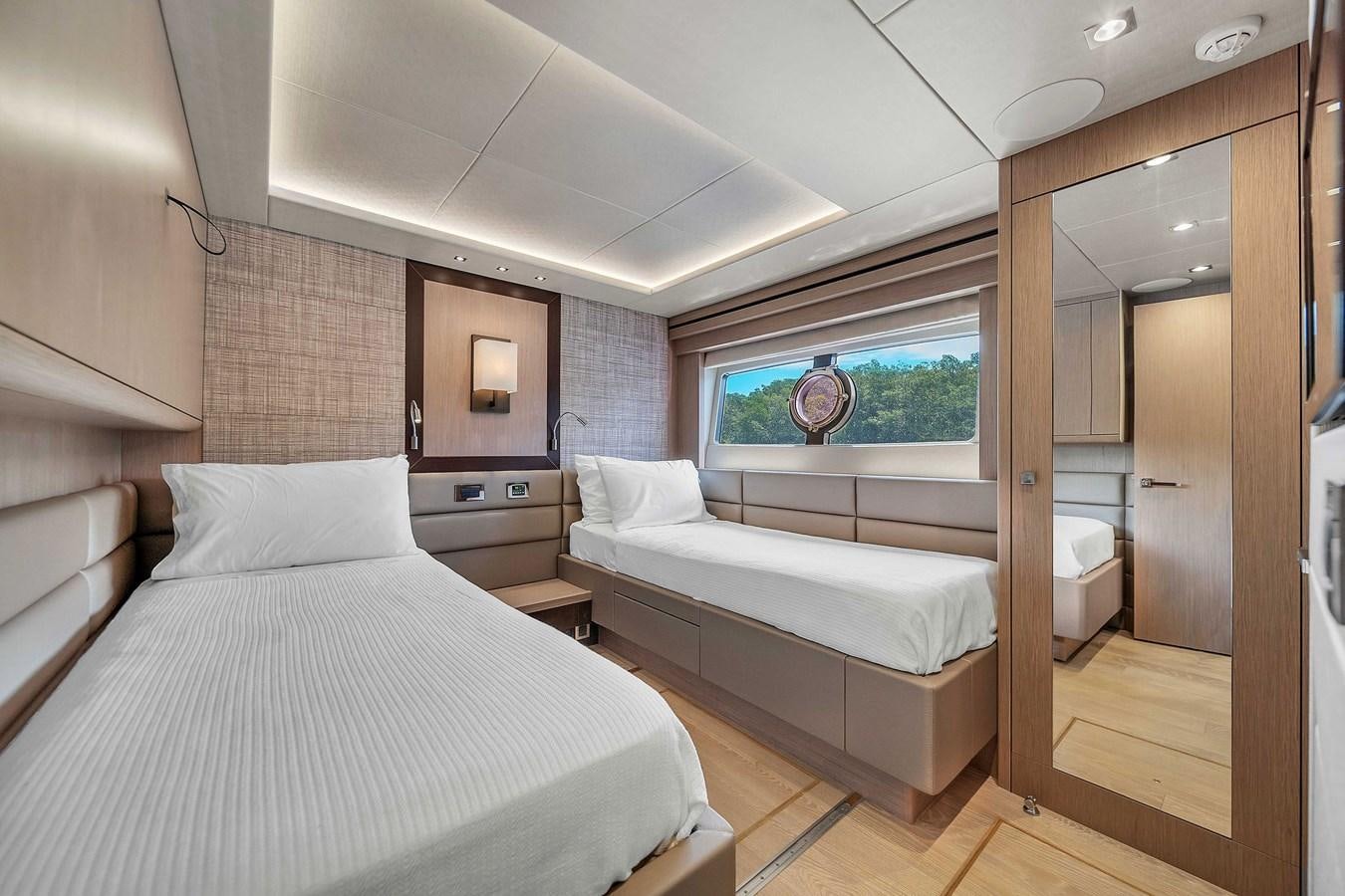 a room with a bed and a mirror aboard 86 Yacht for Sale